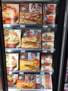 Des produits surgelés de Como Pizzeria en vente dans les épiceries